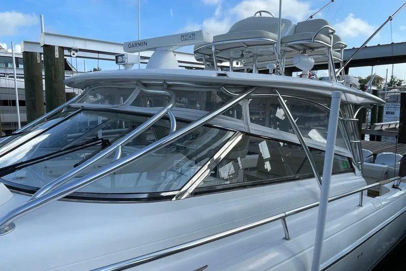 Slide: The Image of 2009 Intrepid 430 Sport Yacht with sleek design and advanced Garmin navigation system. - 13