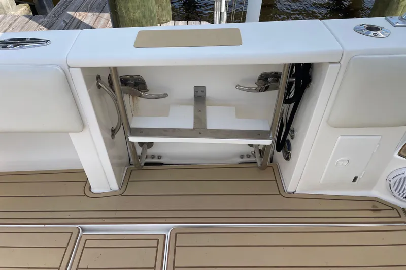 Slide: The Image of 2009 Intrepid 430 Sport Yacht swim platform with ladder and teak decking. - 28