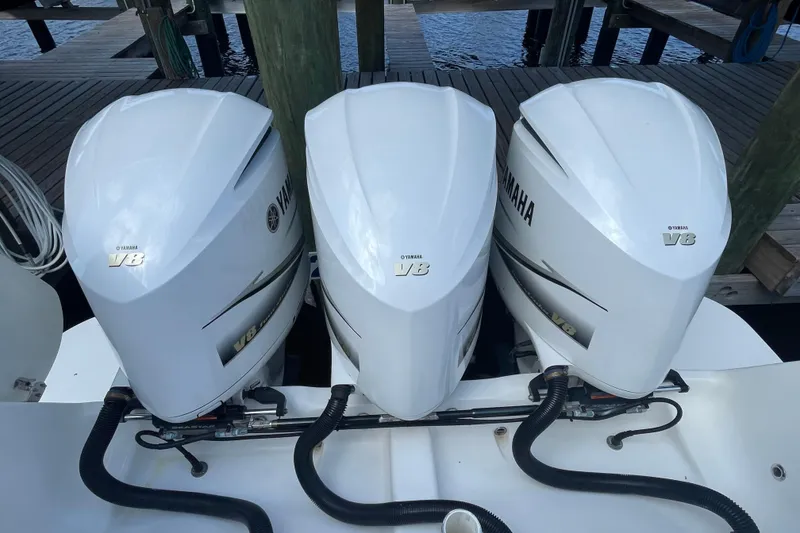 Slide: The Image of Triple Yamaha V8 outboard engines on a 2009 Intrepid 430 Sport Yacht. - 31