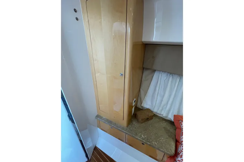 Slide: The Image of Interior of 2009 Intrepid 430 Sport Yacht with wooden cabinet and countertop. - 55