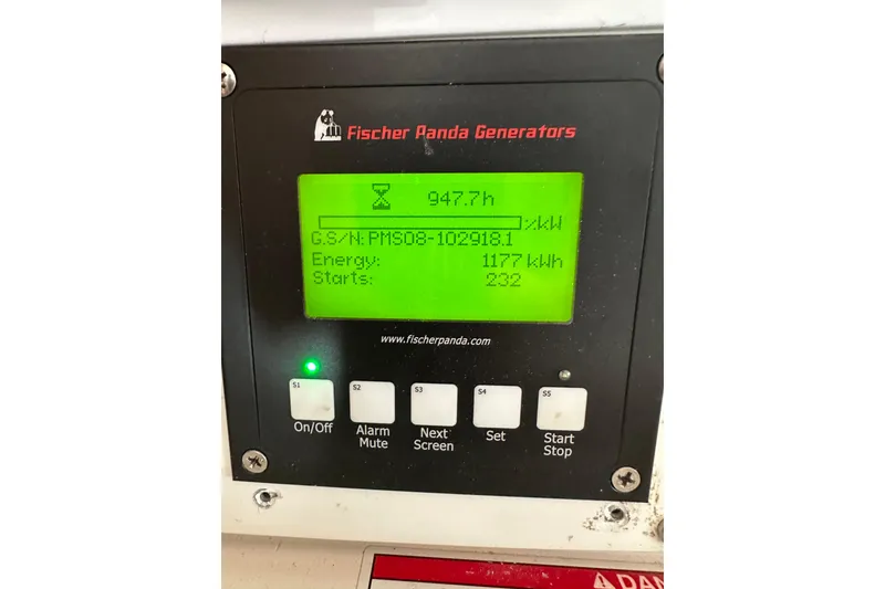 Slide: The Image of Fischer Panda generator display on 2009 Intrepid 430 Sport Yacht, showing 947.7 hours and 1177 kWh. - 62