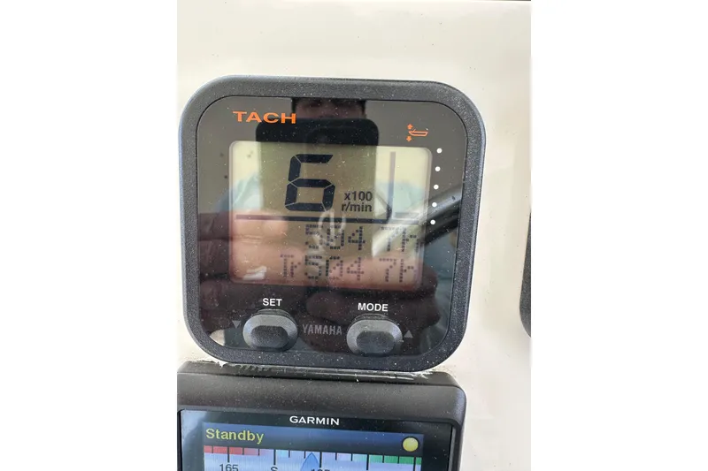 Slide: The Image of Close-up of Yamaha tachometer on 2009 Intrepid 430 Sport Yacht dashboard. - 63