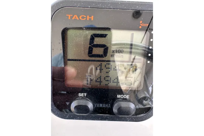 Slide: The Image of Tachometer display on 2009 Intrepid 430 Sport Yacht, showing RPM and settings. - 64