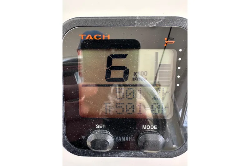 Slide: The Image of Tachometer display on 2009 Intrepid 430 Sport Yacht, showing RPM and settings. - 65