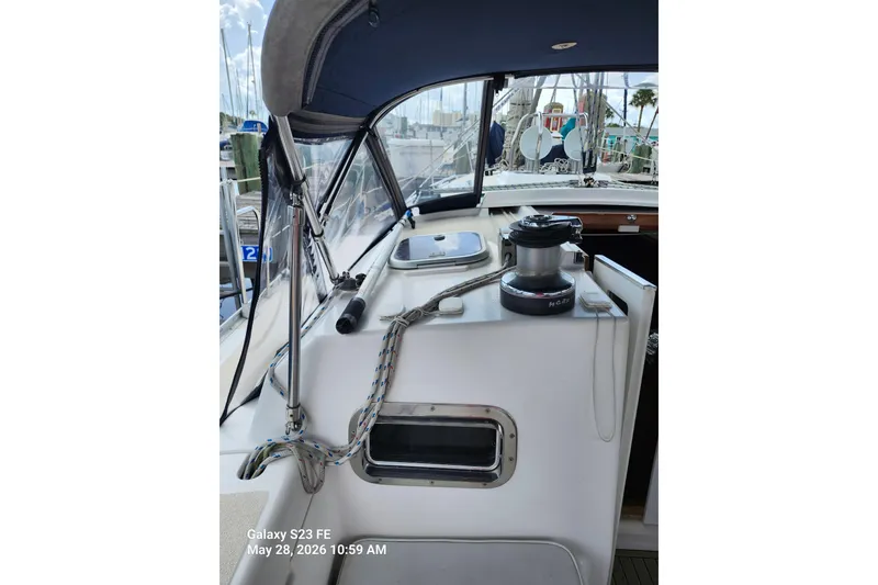 Slide: The Image of Cockpit view of a 1995 Freedom 35 sailboat with winch and ropes. - 34