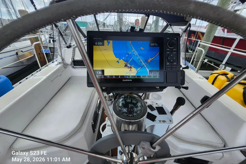Slide: The Image of Cockpit of 1995 Freedom 35 sailboat with Garmin navigation system and compass. - 36