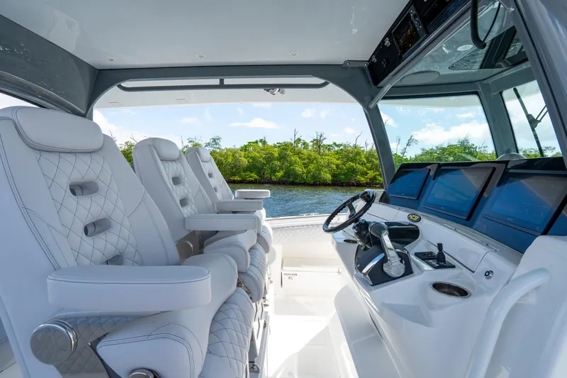 Slide: The Image of Luxurious interior of 2026 HCB 42 Lujo boat with plush seating and advanced controls. - 35