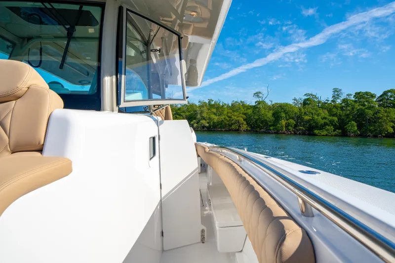 Slide: The Image of Luxurious HCB 42 Lujo boat cruising on a sunny day, 2027 model. - 37