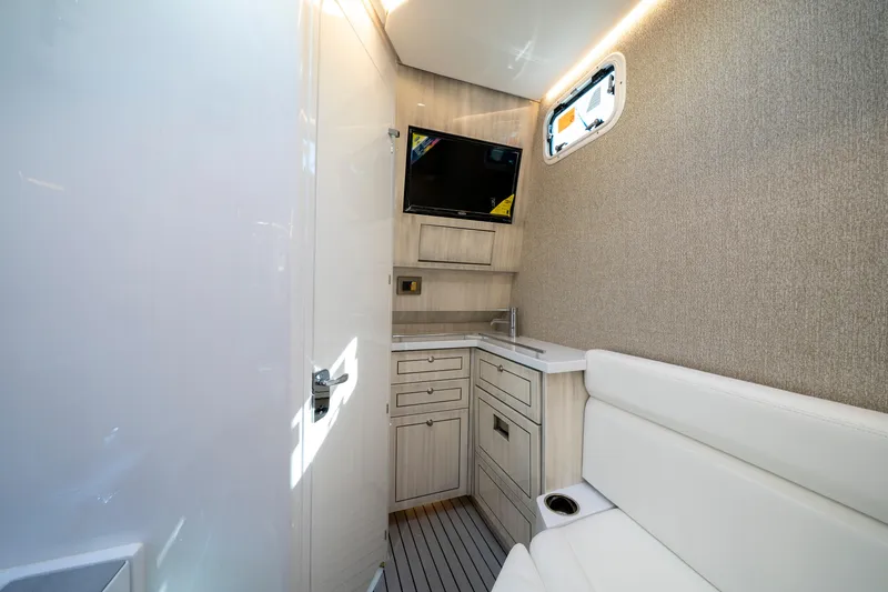 Slide: The Image of Luxurious interior of 2027 HCB 42 Lujo boat with modern amenities and sleek design. - 54