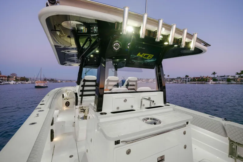 Slide: The Image of Luxury HCB 42 Lujo boat interior at sunset, showcasing sleek design and modern amenities. - 53
