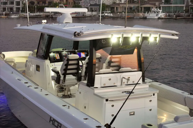Slide: The Image of 2026 HCB 42 Lujo boat with illuminated cockpit and advanced navigation systems. - 14