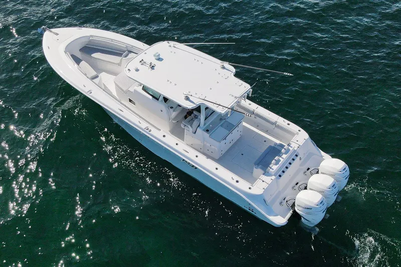 Slide: The Image of 2027 HCB 39 Speciale boat cruising on open water, aerial view. - 12