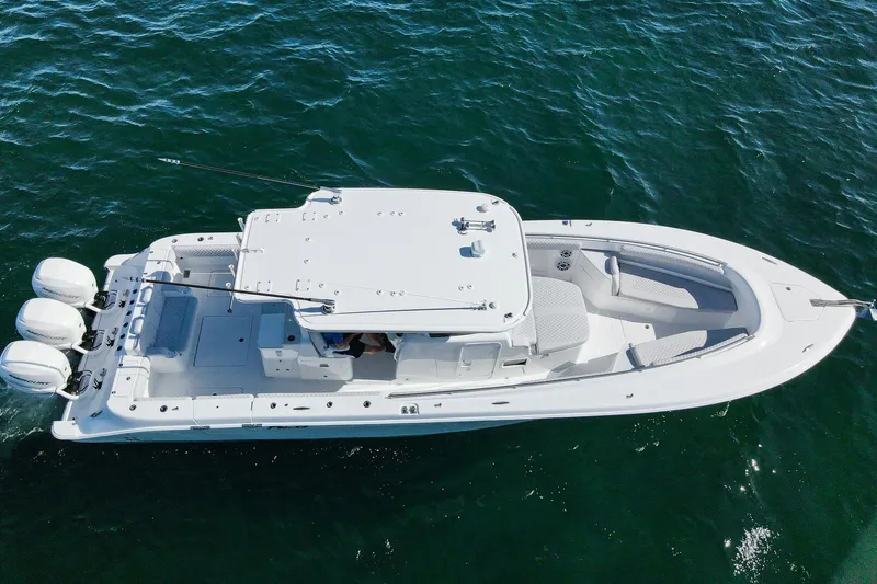 Slide: The Image of Aerial view of 2027 HCB 39 Speciale boat cruising on open water. - 14