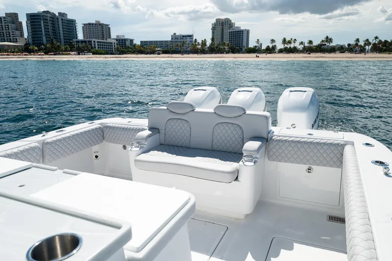 Slide: The Image of Luxurious 2027 HCB 39 Speciale boat interior with plush seating, ocean view, and modern design. - 21
