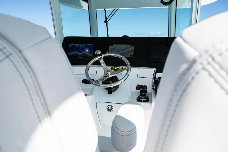 Slide: The Image of Interior of 2027 HCB 39 Speciale boat with modern steering and controls. - 23