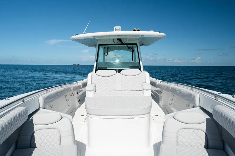 Slide: The Image of 2027 HCB 39 Speciale luxury boat on open sea, featuring sleek design and spacious seating. - 29