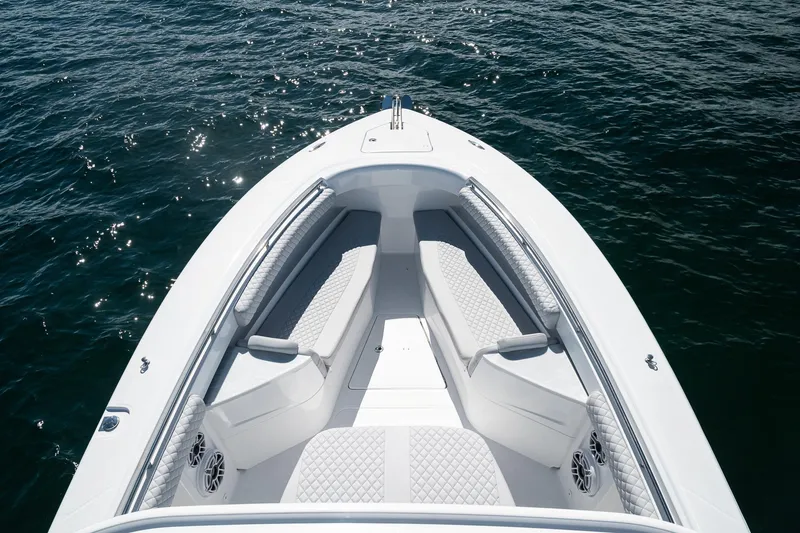 Slide: The Image of 2027 HCB 39 Speciale boat bow with luxurious seating on open water. - 33