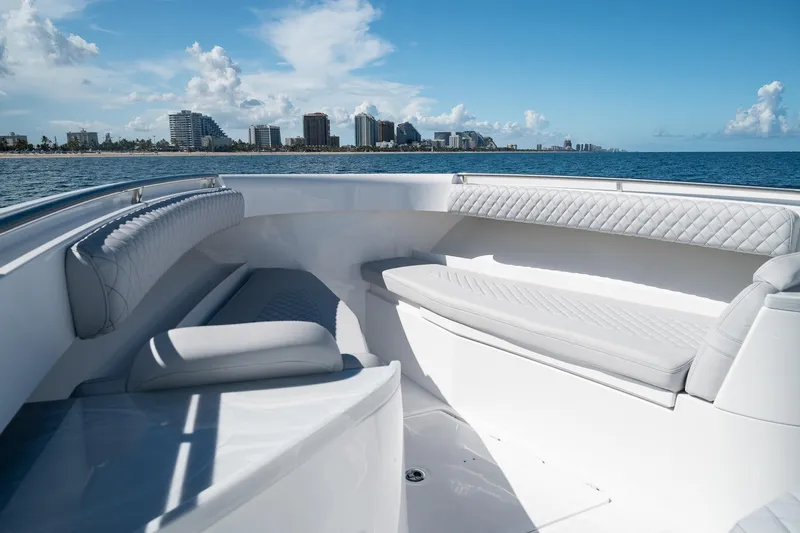 Slide: The Image of Luxury seating on 2027 HCB 39 Speciale boat with city skyline in background. - 35