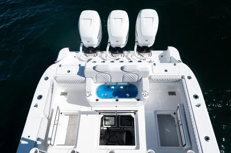 Slide: The Image of Overhead view of 2027 HCB 39 Speciale boat with triple engines and luxurious deck. - 37