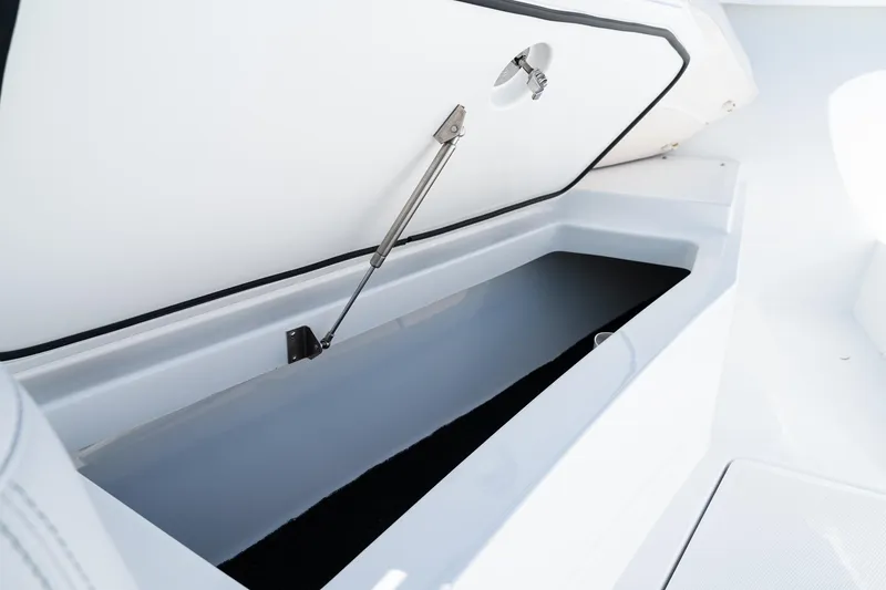 Slide: The Image of Open storage compartment on 2027 HCB 39 Speciale boat, showcasing sleek design and functionality. - 38