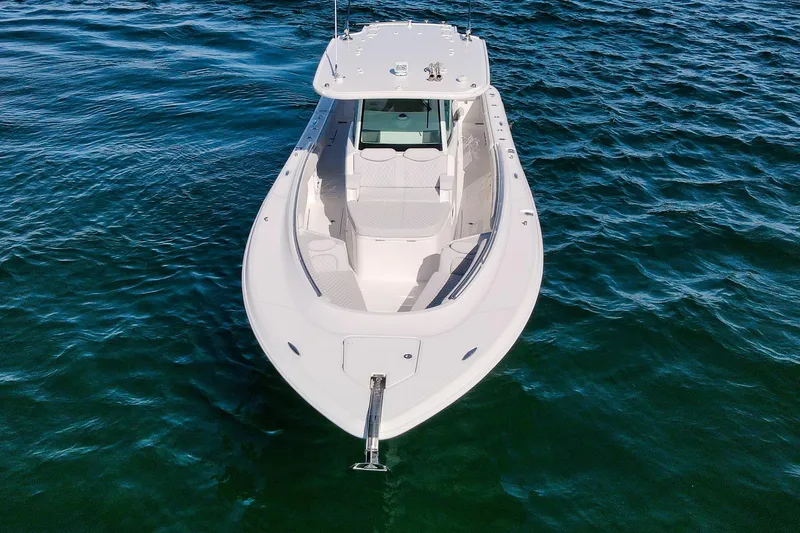 Slide: The Image of 2027 HCB 39 Speciale boat on open water, aerial view. - 9