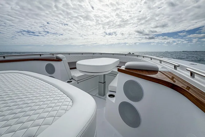 Slide: The Image of Luxurious 2027 HCB 48 Campeon yacht interior with elegant seating and ocean view. - 51