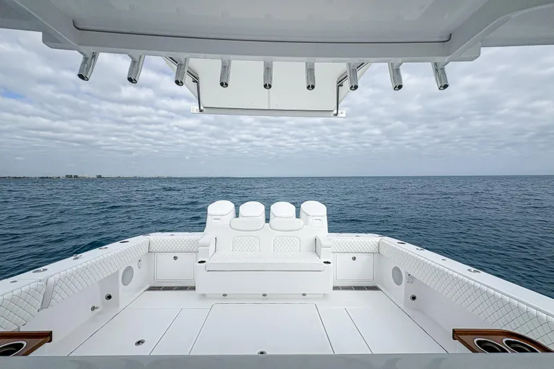 Slide: The Image of 2027 HCB 48 Campeon boat deck with ocean view and luxurious seating. - 55
