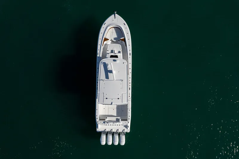 Slide: The Image of Aerial view of 2027 HCB 48 Campeon boat on calm water. - 9