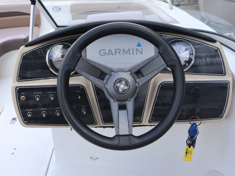 Slide: The Image of Steering wheel and dashboard of a 2018 Hurricane SunDeck SD 191 OB boat. - 13