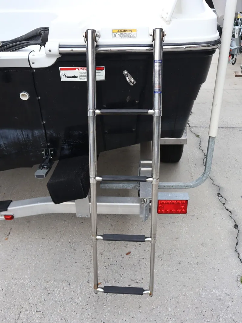 Slide: The Image of 2018 Hurricane SunDeck SD 191 OB boat with ladder. - 25