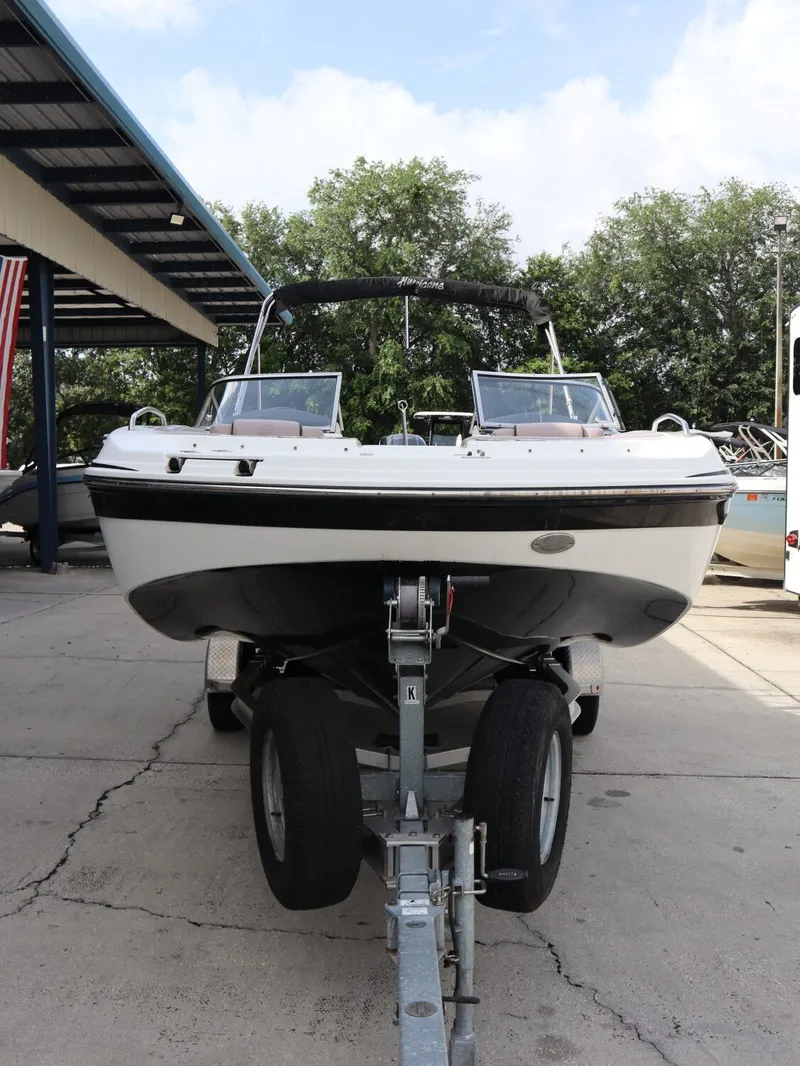 Slide: The Image of 2018 Hurricane SunDeck SD 191 OB boat on trailer outdoors. - 3