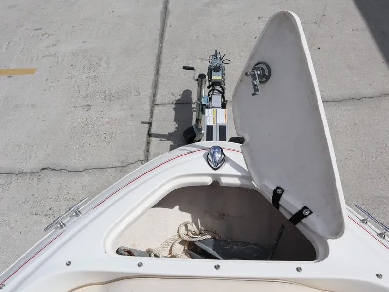 Slide: The Image of Open storage compartment of a 2001 Monterey 200LS boat. - 20