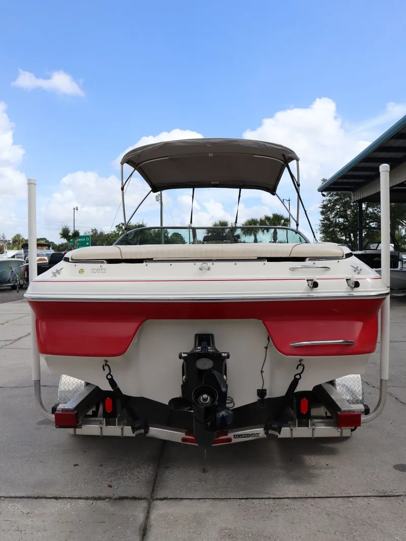 Slide: The Image of Red 2001 Monterey 200LS boat on a trailer, rear view. - 8