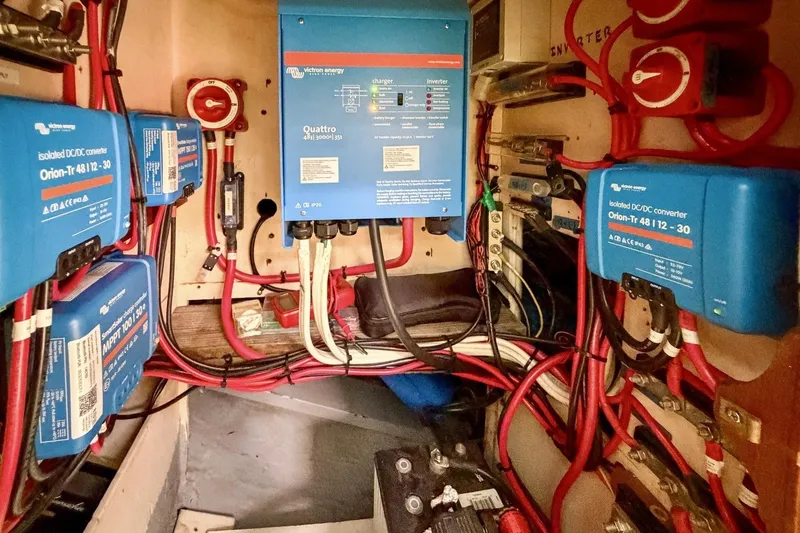 Slide: The Image of Electrical system setup in a 1987 Nonsuch 30 Ultra sailboat with Victron Energy components. - 26