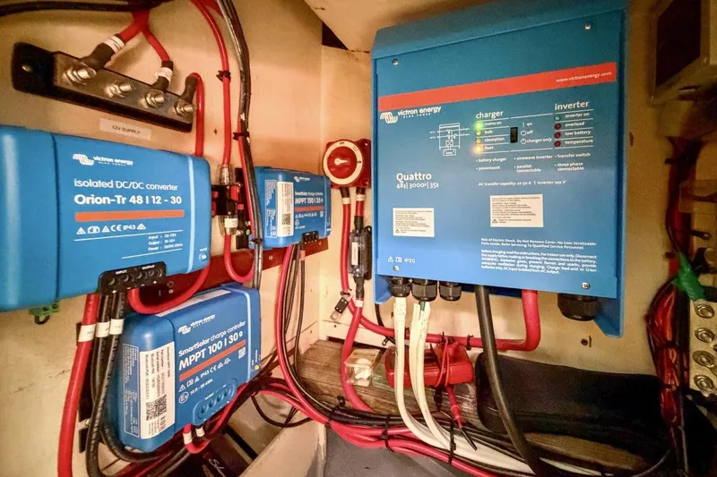Slide: The Image of Electrical system setup in a 1987 Nonsuch 30 Ultra sailboat with Victron Energy components. - 27