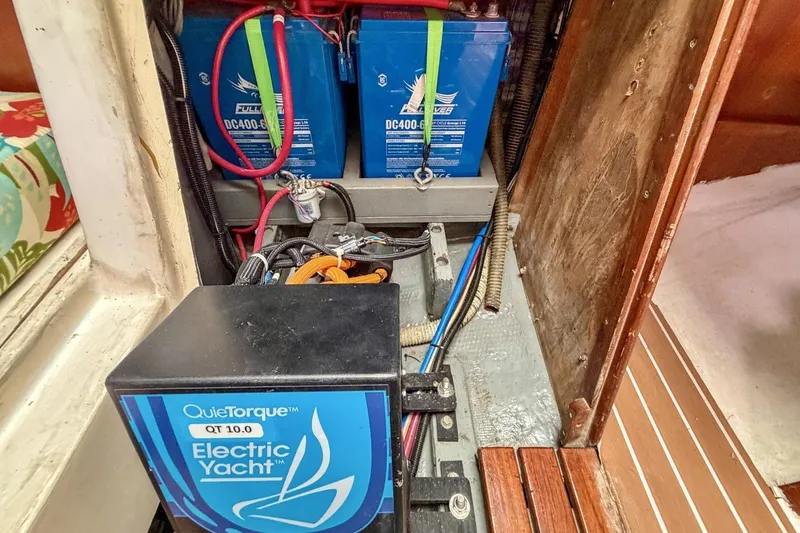 Slide: The Image of Electric motor and batteries inside a 1987 Nonsuch 30 Ultra yacht. - 28