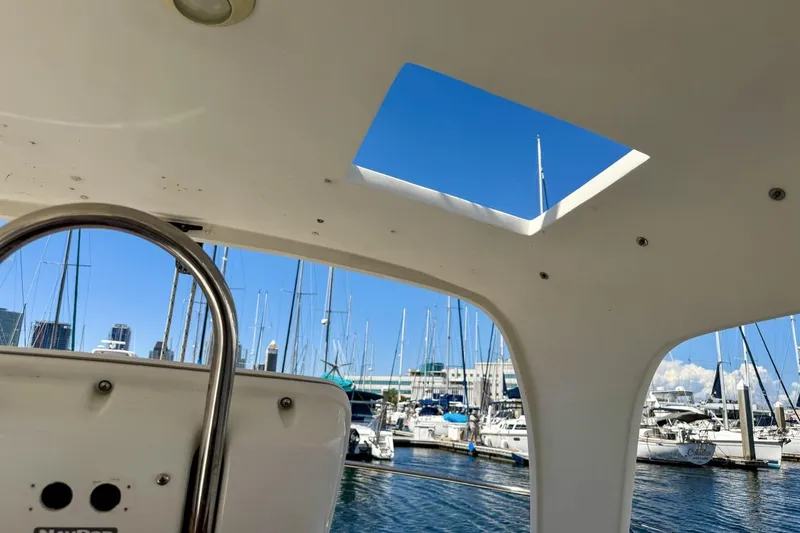 Slide: The Image of Interior view of a 1987 Nonsuch 30 Ultra sailboat in a marina. - 44
