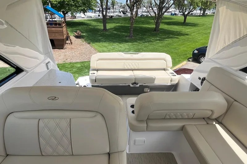 Slide: The Image of Luxurious interior of 2018 Regal 35 Sport Coupe with plush seating and scenic view. - 23