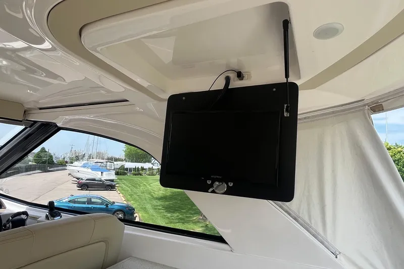 Slide: The Image of Interior of 2018 Regal 35 Sport Coupe with mounted TV screen. - 28
