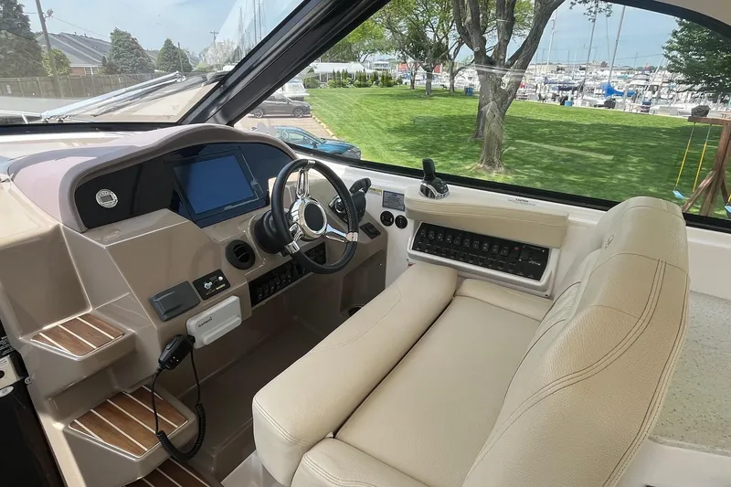Slide: The Image of 2018 Regal 35 Sport Coupe helm with modern controls and comfortable seating. - 29