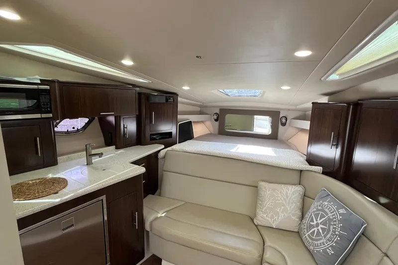 Slide: The Image of Luxurious interior of 2018 Regal 35 Sport Coupe with modern kitchen and cozy seating. - 46