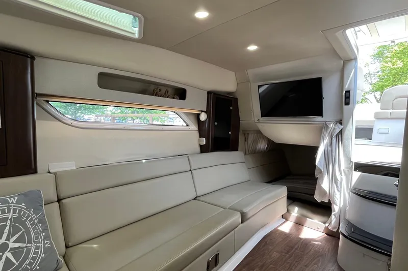 Slide: The Image of Luxurious interior of a 2018 Regal 35 Sport Coupe with modern seating and TV. - 47