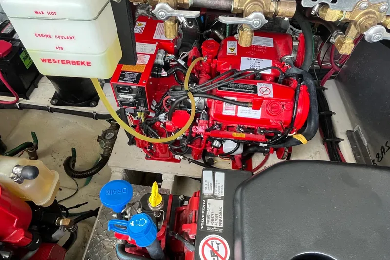 Slide: The Image of Engine compartment of a 2018 Regal 35 Sport Coupe with Westerbeke components. - 55