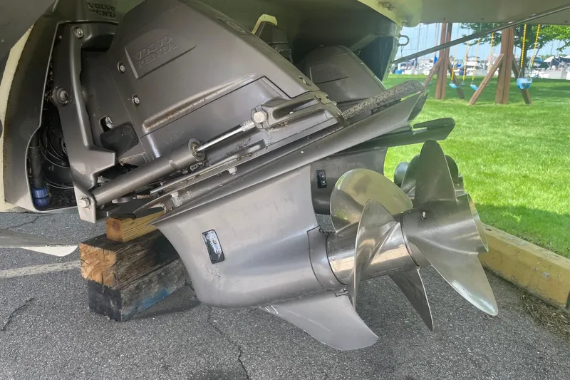 Slide: The Image of Close-up of 2018 Regal 35 Sport Coupe's Volvo Penta outdrive on wooden blocks. - 8