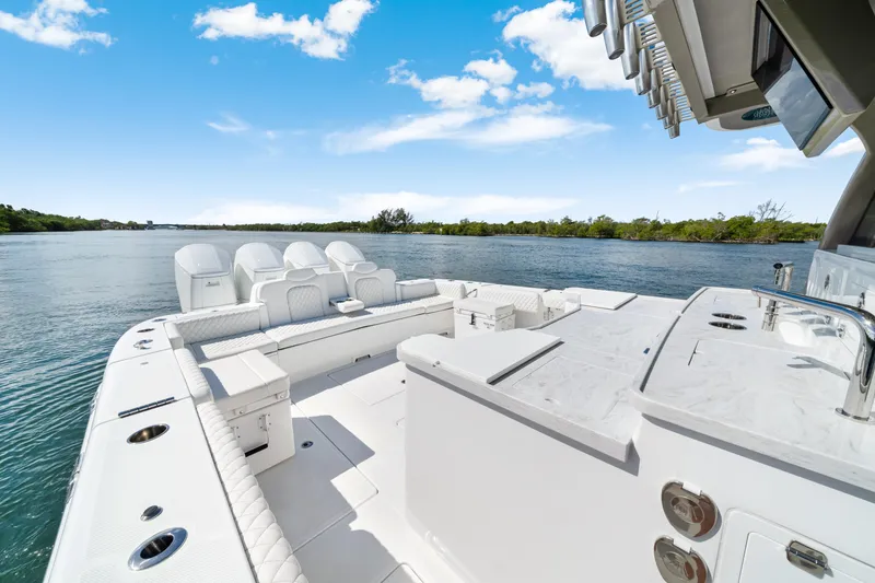 Slide: The Image of Luxurious 2027 HCB 53 Suenos boat with spacious deck and scenic water view. - 25