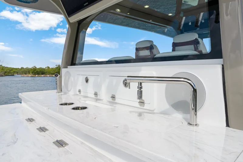 Slide: The Image of Luxury HCB 53 Suenos 2027 yacht interior with sleek countertop and modern fixtures. - 37