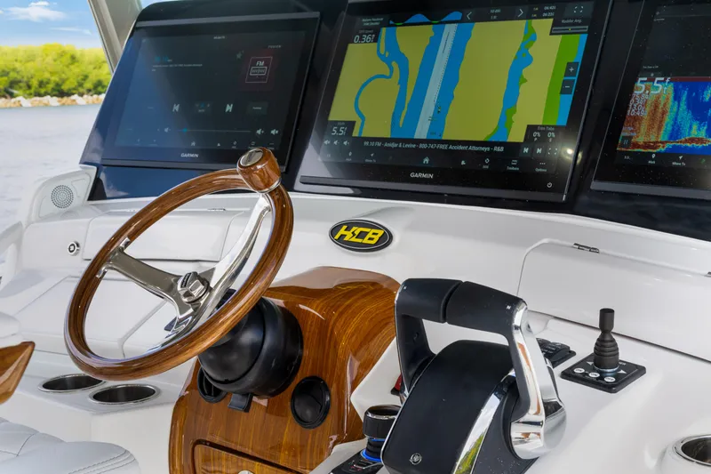 Slide: The Image of Helm of 2027 HCB 53 Suenos with advanced navigation displays and controls. - 53