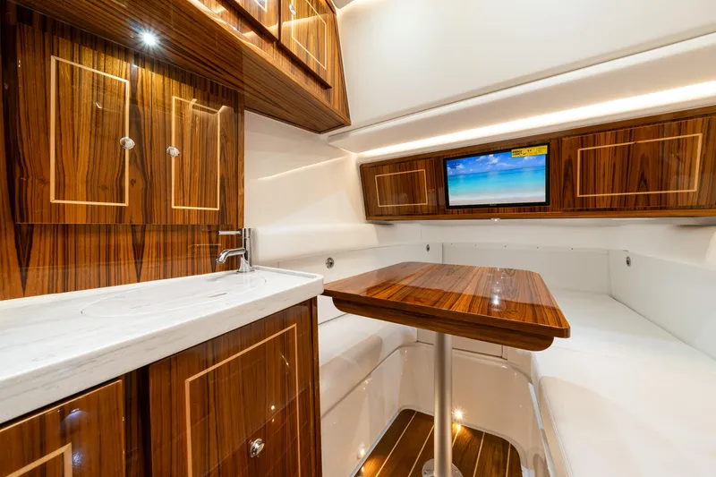 Slide: The Image of Luxurious interior of 2027 HCB 53 Suenos yacht with wood finish and modern amenities. - 69