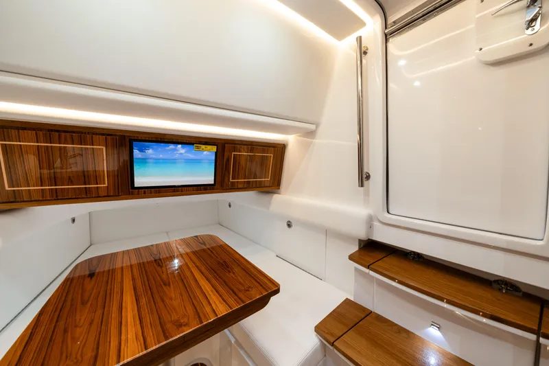 Slide: The Image of Luxurious interior of 2027 HCB 53 Suenos yacht with wood accents and modern amenities. - 70