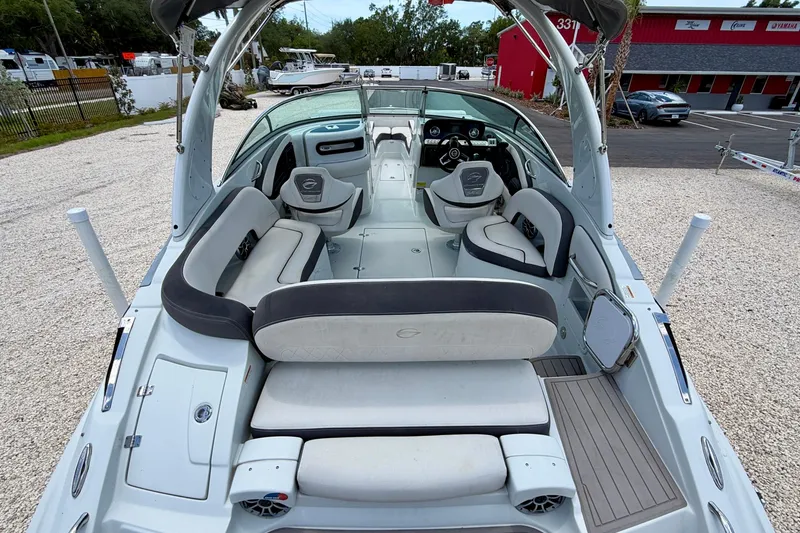 Slide: The Image of 2022 Crownline 260 XSS boat interior with spacious seating and modern design. - 14